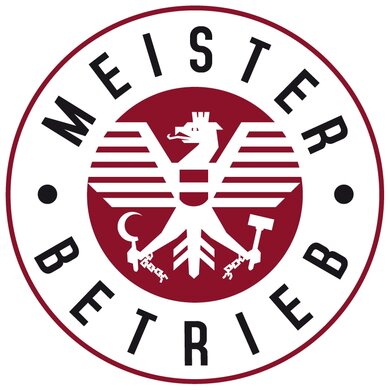 Meisterbetrieb, Metallbautechnik, Stahlbautechnik, Schlosserei Meisterbetrieb-Logo: Im Inneren befindet sich ein roter Kreis mit einem weißen Adler und der Österreich-Flagge, außen steht geschrieben "Meisterbetrieb"